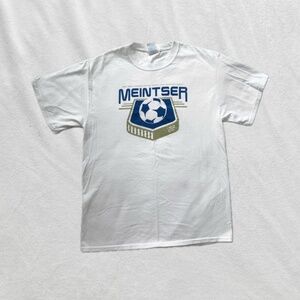white blue tan gold soccer tee